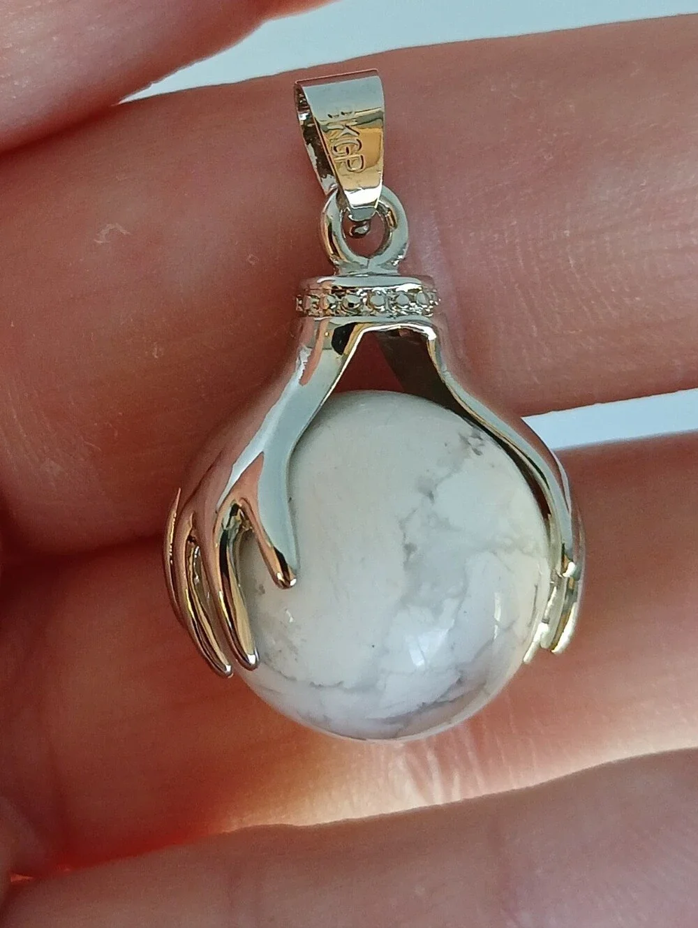 New 18K Hands Holding Howlite Sphere Pendant.